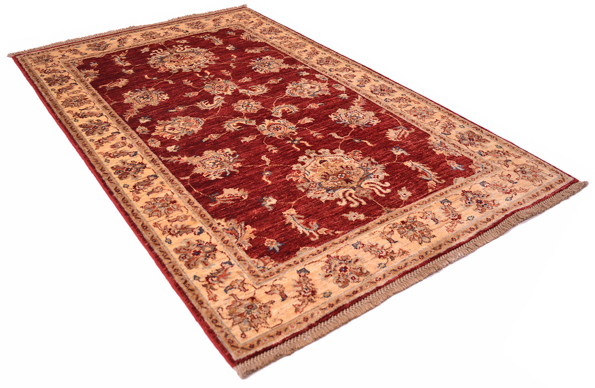 Angled view of Classic Ziegler design with cream gold border and stunning russet red field colour.