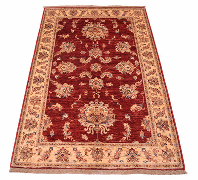 Floral palmettes and tendrils of Ziegler design carpet in cream and rusty red