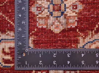 Back of handknotted rug showing back of knots and weave. 