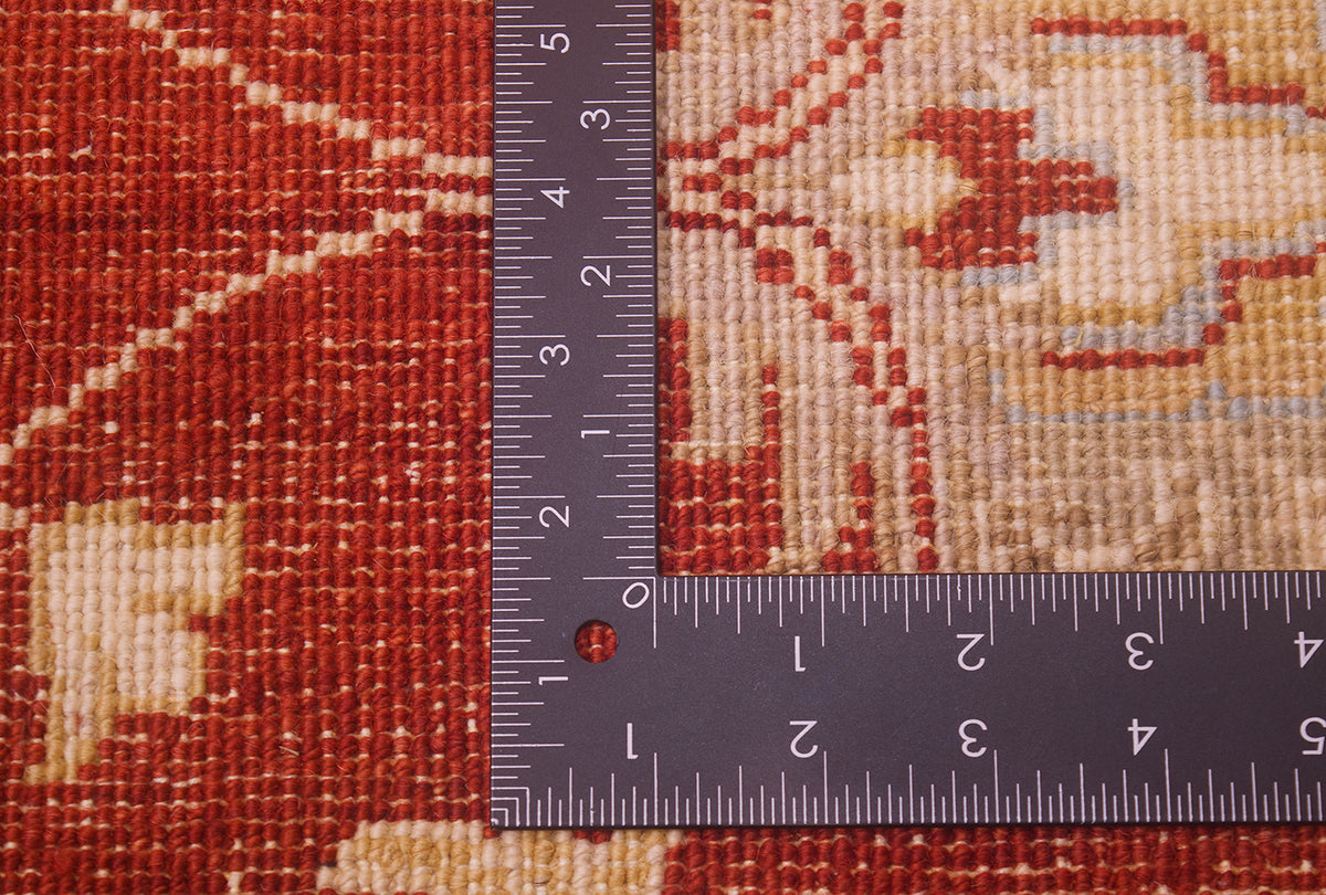 Reverse of carpet showing back of knows and weave