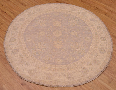 Beautiful handmade Afghan Ziegler Circle Rug with soft colours of grey with beige in a hard-to-find circular rug size.