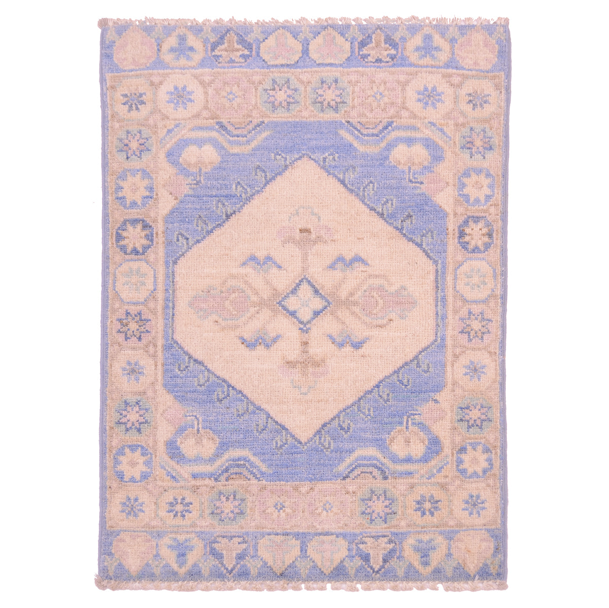 Oushak design mat with cream medallion on a light blue ground.