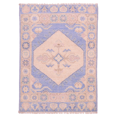 Oushak blue and cream area rug with geometric medallion pattern